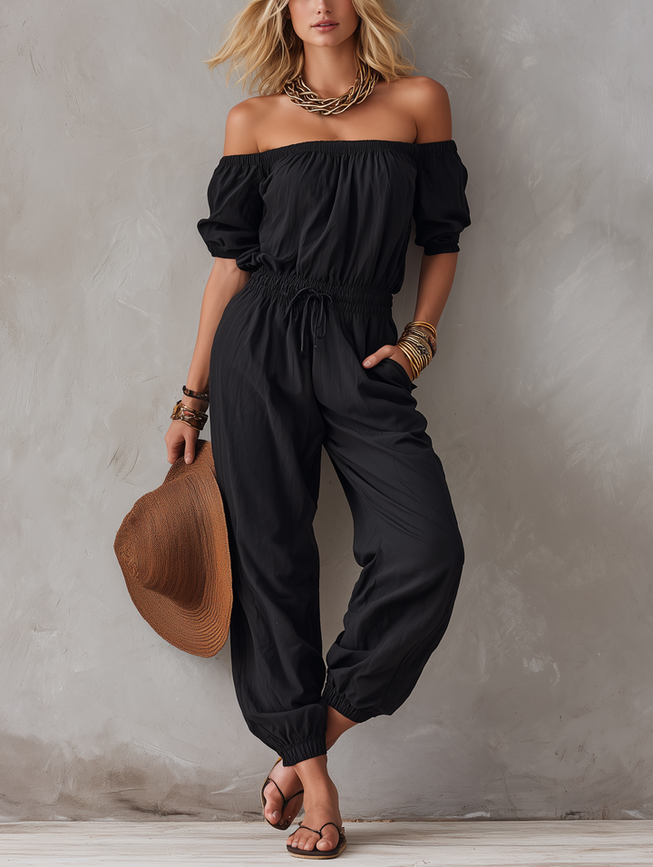 Nisan -  織り生地のオフショルダー・ノースリーブジャンプスーツ