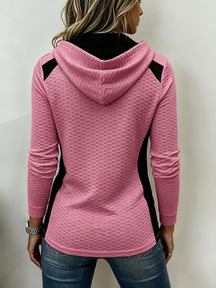 Leinea - テクスチャー加工のカラーブロック・フード付きトップス