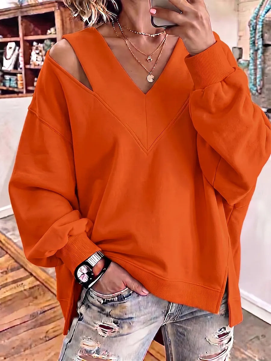 Kirstan - シックなカットアウトVネック オーバーサイズスウェットシャツ