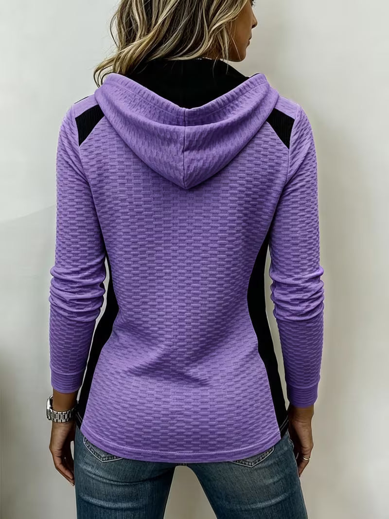 Leinea - テクスチャー加工のカラーブロック・フード付きトップス