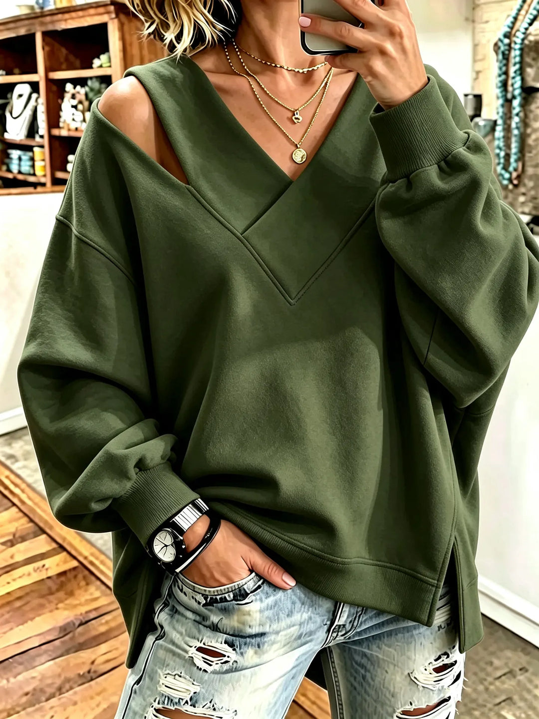 Kirstan - シックなカットアウトVネック オーバーサイズスウェットシャツ