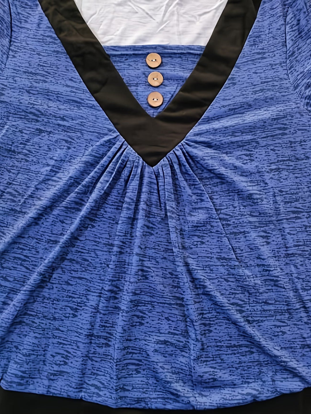 Grisel - エレガントなフレアTシャツ
